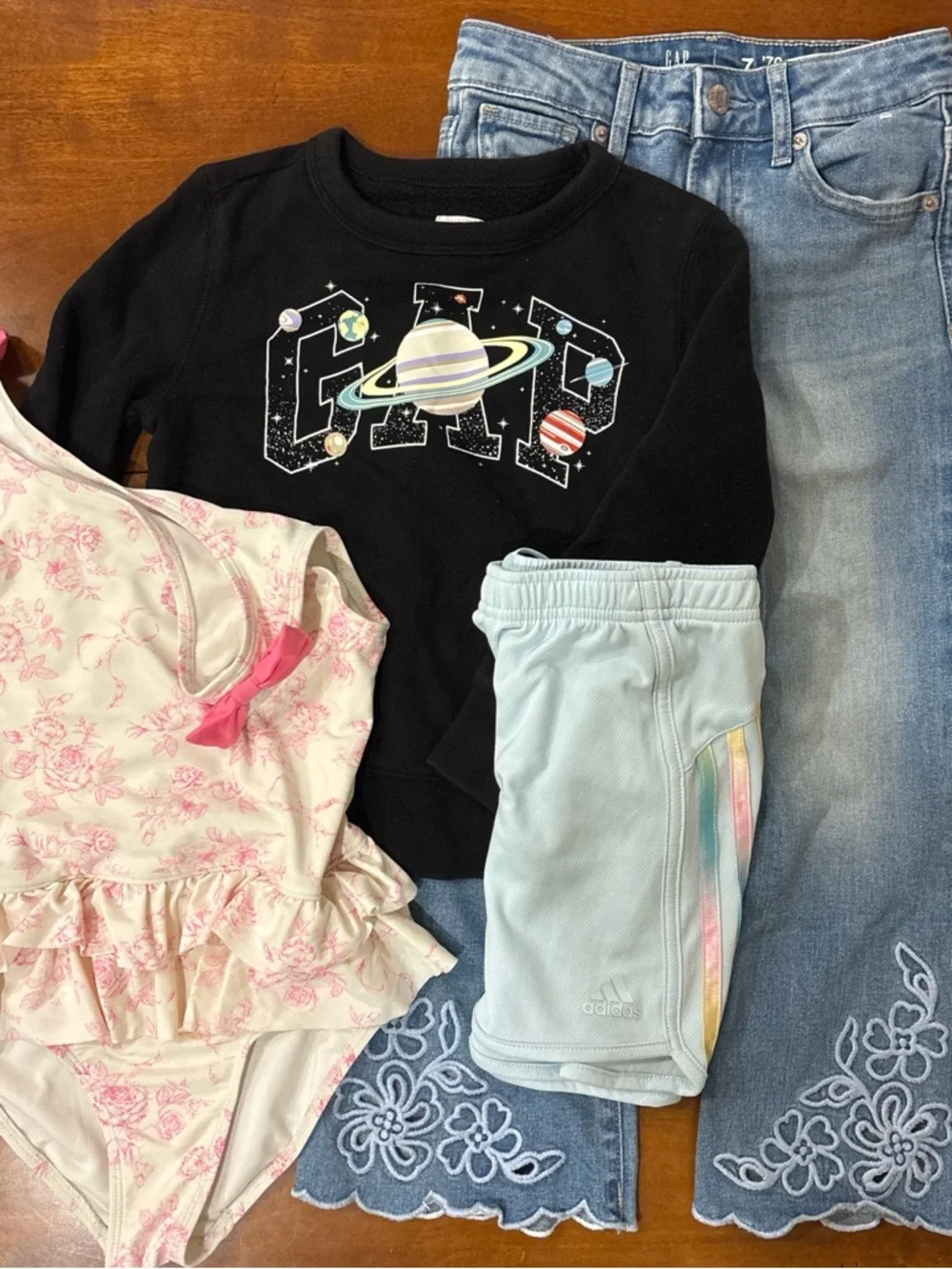 Lot of 4 girls 7/8: gap kids jeans, sweatshirt, adidas shirts Gymboree swimsuit